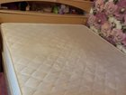 Двухспальная кровать с прикроватными тумбами